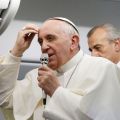 Pope Francis speaks to the media aboard the papal flight from Rio de Janeiro to Rome July 28.