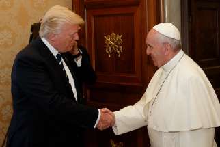 Pope Francis greets U.S. President Donald Trump during a private audience at the Vatican May 24. 