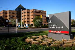 This is a general view of a sign in front of the main entrance to Ascension St. John Hospital in Detroit May 10, 2023. In a May 9, 2024, statement, Ascension reported it had experienced a suspected cyberattack the day before, causing a disruption to some of the Catholic health care system&#039;s services.