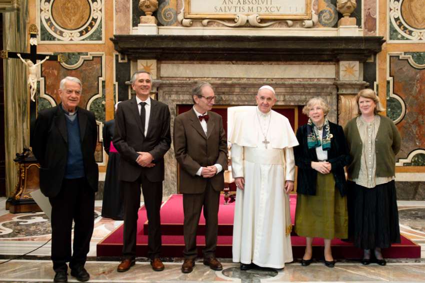 Pope Francis is pictured with Ratzinger Prize recipients at the Vatican Nov. 13, 2021. From left are Jesuit Father Federico Lombardi, president of the Joseph Ratzinger-Benedict XVI Foundation; German professor Ludger Schwienhorst-Schönberger; French professor Jean-Luc Marion; Pope Francis; German professor Hanna-Barbara Gerl-Falkovitz; and Australian professor Tracey Rowland. The award honors theological research and is named after retired Pope Benedict XVI, the former Joseph Ratzinger.