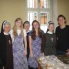From left to right, Sr. Alina Ploszczyca, Provincial Minister of the Krakow Province, student Jessica Pelletier, Sr. Mary Archangela Bojarczuk, a Felician sister from Toronto who accompanied the group, student Victoria Smirlies, an unidentified Felician sister from Poland and student Kamila Swiderski stand in the soup kitchen in Krakow.