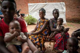 People displaced by interethnic violence in Tombura, South Sudan, are pictured in Yambio, South Sudan, Sept. 11, 2021. They took refuge in the home of relatives, where they received material assistance from the local Catholic diocese.