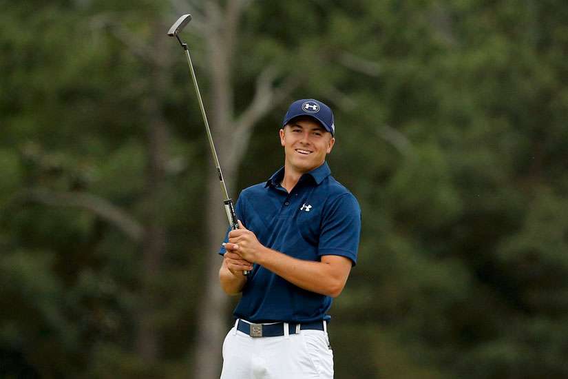 U.S. golfer Jordan Spieth smiles April 12 after sinking his putt on the 18th hole to win the Masters golf tournament at Augusta National Golf Course in Georgia. The 21-year-old golfer attended St. Monica&#039;s Catholic School in Dallas and graduated in 2011 from Jesuit College Prep in Dallas.