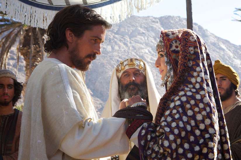 Christian Bale, Kevork Mailkyan, center, and Maria Valverde star in a scene from the movie &quot;Exodus: Gods and Men.&quot; The Catholic News Service classification is A-III -- adults. The Motion Picture Association of America rating is PG-13 -- parents strongly cautioned. Some material may be inappropriate for children under 13.