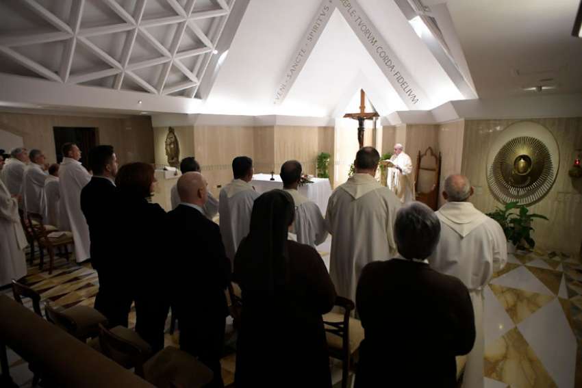 Pope Francis celebrates morning Mass in the chapel of his residence at the Vatican Jan. 30.