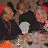 Friends since first meeting in 2005, Cardinal Oswald Gracias (left) and Cardinal Thomas Collins share conversation during dinner at the Swagat Banquet Hall. 