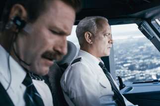 Arron Eckhart and Tom Hanks star in a scene from the movie &quot;Sully.&quot;