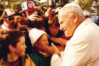 These children were among 350,000 people at Martyr’s Shrine for Pope John Paul II’s visit in 1984.