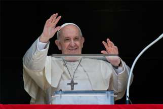 Pope Francis waves as he leads the Angelus from the window of his studio overlooking St. Peter&#039;s Square at the Vatican Sept. 5, 2021. The pope offered prayers to the victims and families affected by Hurricane Ida, which devastated the southern and northeastern United States. He also offered prayers for Afghan refugees.