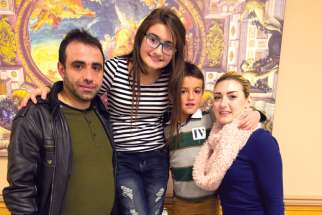 The Kazanjian family, refugees from Aleppo, Syria, who are spending their first Christmas in Toronto this year.