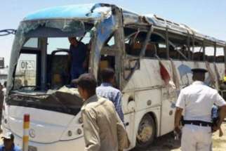 A bus carrying Coptic Christians in southern Egypt is seen after gunmen attacked it May 26. The Health Ministry reports at least 26 fatalities, with at least 25 more wounded.