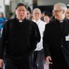 Philippine Cardinal Luis Tagle of Manila walks with Philippines&#039; apostolic nuncio, Archbishop Giuseppe Pinto, after his arrival at the Ninoy Aquino International Airport in Manila March 21. Cardinal Tagle was returning from the Vatican after the inaugura l Mass of Pope Francis.