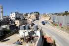 he Israeli separation wall, right, is seen at the edge of the Aida refugee camp, left, in Bethlehem, West Bank.