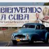 A car drives past a Havana billboard welcoming Pope Benedict XVI to Cuba. Pope Benedict will visit Cuba March 26-28. 