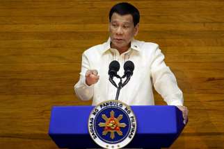 Philippine President Rodrigo Duterte delivers his State of the Nation address July 23 at the House of Representatives in Manila. Religious leaders and activists say human rights are dying under Duterte&#039;s rule.