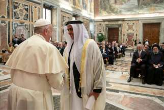 Pope Francis greets Sheikh Saif bin Zayed Al Nahyan, minister of the interior of the United Arab Emirates, Nov. 14, 2019, during an audience at the Vatican for participants in an international conference on protecting children and preventing their exploitation online.