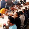 Migrants eat at the St. Juan Diego migrant shelter in Tultitlan, Mexico, Jan. 20. A new Pew Hispanic report shows that fewer Mexicans are entering the U.S. -- down by about half, from 3 million to 1.4 million -- and more are returning to their homeland -- nearly doubling in the five-year period of 2005-2010 to almost 1.4 million, from 667,000 the previous five years.