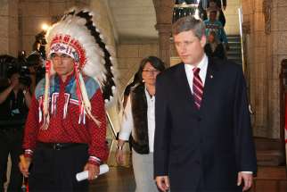 Assembly of First Nations Chief Phil Fontaine and Prime Minister Stephen Harper on June 11, 2008, when Harper made an historic apology for the government’s role in Indian residential schools. 