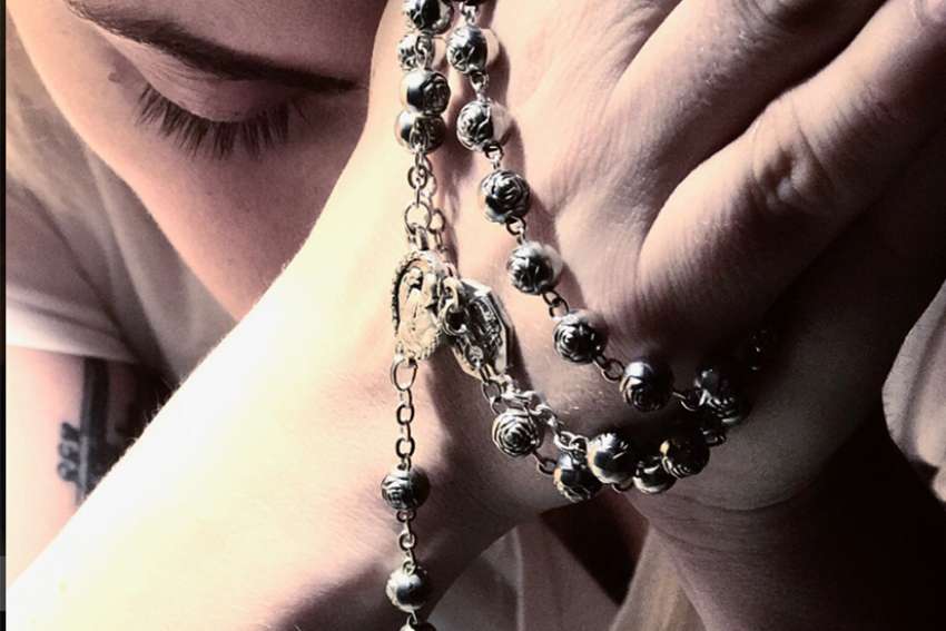 Stefani Germanotta, known as Lady Gaga, posted a photo on social media of herself praying the rosary on Sept. 18.