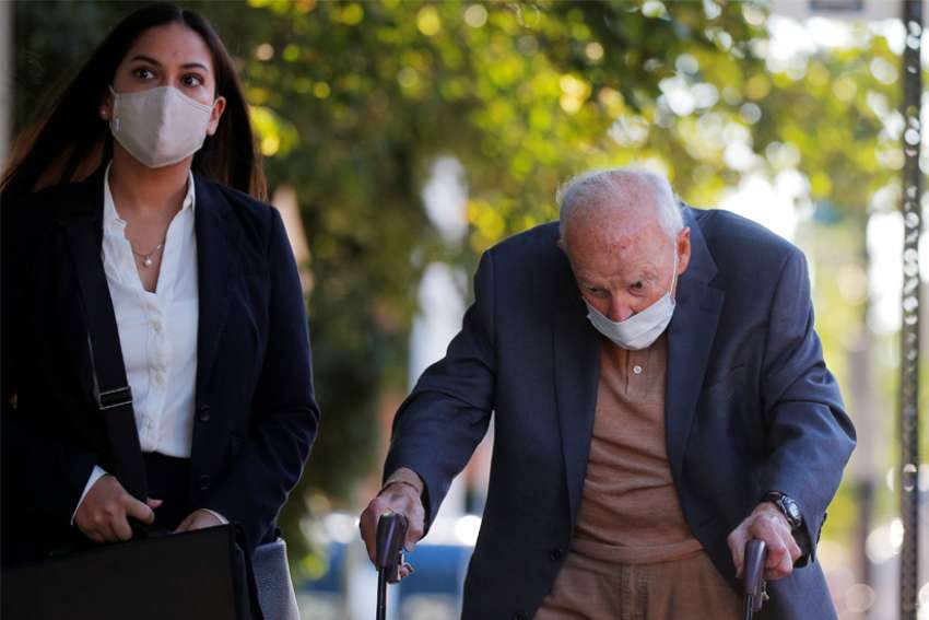 Former Cardinal Theodore E. McCarrick arrives at Dedham District Court in Dedham, Mass., Sept. 3, 2021, after being charged with molesting a 16-year-old boy during a 1974 wedding reception.
