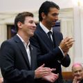 Two international soccer stars, Argentina&#039;s Lionel Messi and Italy&#039;s Gianluigi Buffon, applaud after a news conference at the Vatican Aug. 13. The two helped launch a Vatican initiative to bring together schools from around the world in projects to promo te understanding and solidarity.