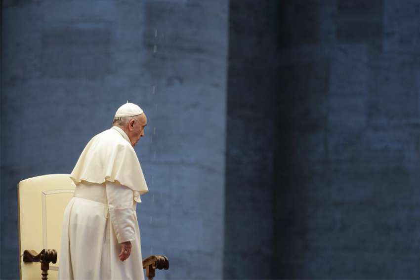 Pope Francis is pictured during a prayer service in an empty St. Peter&#039;s Square at the Vatican in this March 27, 2020, file photo.