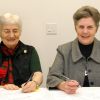 Sr. Marilyn MacDonald, left, community director of the Sisters of Service, and Sisters of St. Joseph congregational leader Sr. Thérèse Meunier sign a sponsorship agreement between the two orders.