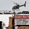 A state police helicopter leaves the grounds of Chardon High School after a gunman shot five students in Chardon, Ohio, Feb. 27. The teenager opened fire with a handgun in the cafeteria of the school east of Cleveland. One student, Daniel Parmertor, who attended St. Mary Church in Chardon, died instantly. A second student, Russell King Jr., was declared brain dead at 1 a.m. Feb. 28. The other three students remained hospitalized.
