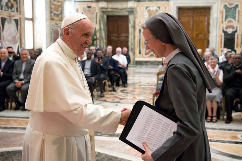  Pope Francis greets Consolata Sister Simona Brambilla, superior general of the Consolata Missionary Sisters, during a June 5 audience with the men&#039;s and women&#039;s branches of the religious missionary congregation.