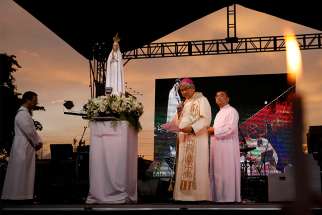 Archbishop Socrates Villegas of Lingayen-Dagupan, Philippines, addresses the crowd during the &quot;Lord, Heal Our Land&quot; Mass Nov. 5 at the Shrine of Mary Queen of Peace in Manila.