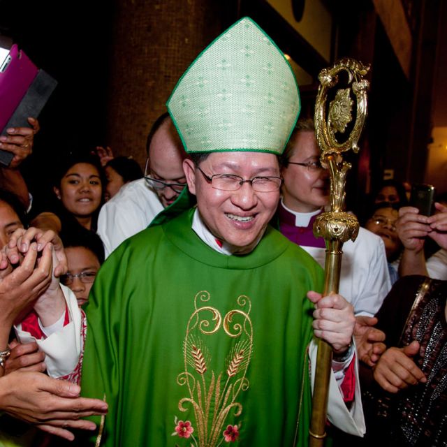 ardinal Luis Antonio Tagle of Manila greets well-wishers as he takes possession of his titular Church of St. Felice da Cantalice on the outskirts of Rome June 15.