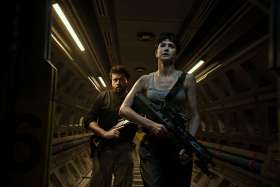 Danny McBride and Katherine Waterston star in a scene from the movie &#039;Alien: Covenant.&#039;