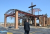 Bishop James V. Johnston Jr. of Springfield-Cape Girardeau, Mo., walks outside the destroyed St. Mary&#039;s Catholic Church in Joplin May 24 after it and the school were destroyed by a monster tornado.