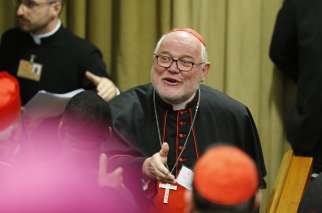 Cardinal Reinhard Marx of Munich arrives for the opening session of the Synod of Bishops on young people, the faith and vocational discernment at the Vatican Oct 3.