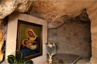 A painting of Mary breast-feeding the infant Jesus is seen at the Milk Grotto chapel in Bethlehem, West Bank.