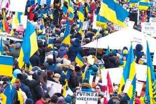 Thousands marched through Toronto streets and rallied at Nathan Phillips Square on Feb. 27 in support of the Ukrainian people and denouncing the Russian invasion.