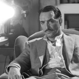 Jean Dujardin stars in a scene from the movie &quot;The Artist.&quot; John Mulderig, assistant director for media reviews at Catholic News Service, cited the film as one of the top 10 films of 2011 suitable for a variety of audiences.