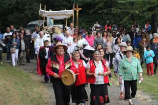 First Nations representatives lead pilgrims to the grotto during the pilgrimage in 2015. The annual event usually attracts thousands, but due to the pandemic and recent fire damage it has been cancelled two years in a row.