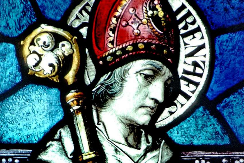 St. Irenaeus of Lyon is pictured in a stained-glass window at the Basilica of Our Lady Immaculate in Guelph, Ontario. Pope Francis received a formal recommendation Jan. 20 to declare St. Irenaeus of Lyon a doctor of the church, the Vatican announced.