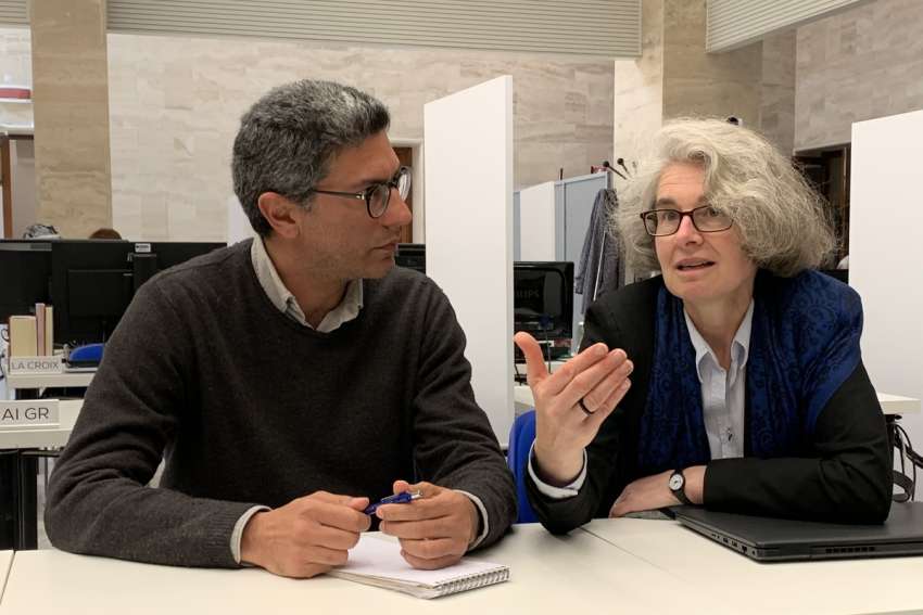 Xavière Missionary Sister Nathalie Becquart, undersecretary of the Synod of Bishops, speaks to Iacopo Scaramuzzi, a reporter for La Repubblica, in the Vatican press office April 26, 2023. The Vatican had just announced Pope Francis&#039; decision to have women and laymen as voting members of the synod.