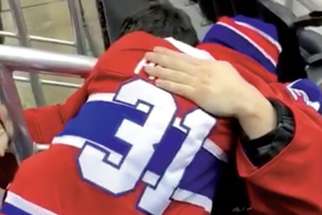Montreal Canadiens’ goaltender Carey Price gives 11-year-old Anderson Whitehead a big hug after practice in February. The boy had lost his mother to cancer in November. The touching moment captured on video by his aunt quickly went viral. 