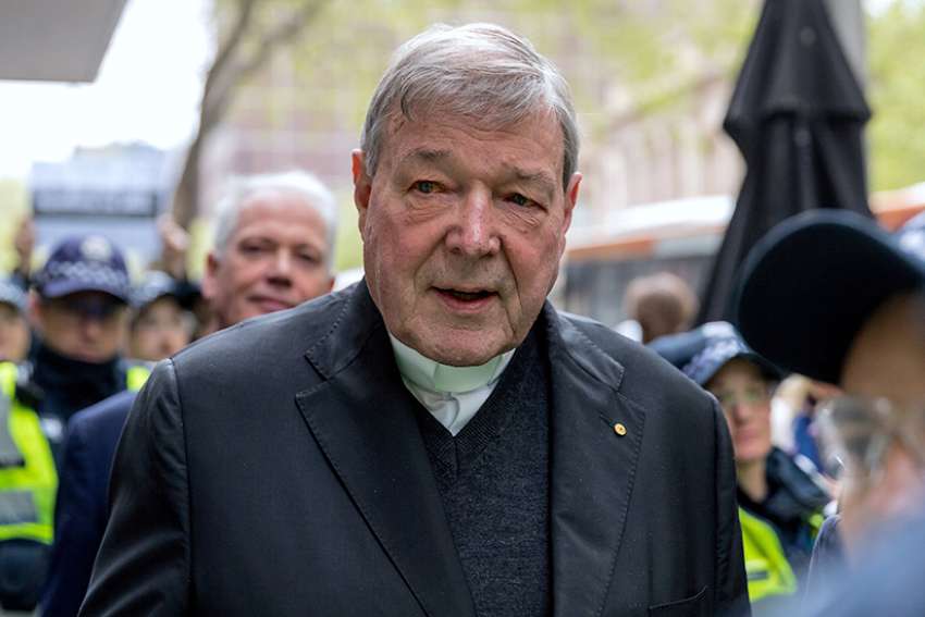 Australian Cardinal George Pell leaves the Melbourne Magistrates Court Oct. 6. 