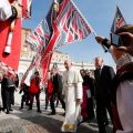 Pope Francis walks through flags of the Italian folklore group &quot;Sestiere di Porta Tufilla&quot; from Ascoli Piceno as he arrives to lead his general audience in St. Peter&#039;s Square at the Vatican Oct. 30.