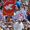 A sign with a dove symbolizing the Holy Spirit is seen as Pope Francis greets the crowd after celebrating a Mass at which he confirmed 44 people in St. Peter&#039;s Square at the Vatican April 28. Those confirmed included two young people from the United Stat es and two from Ireland.