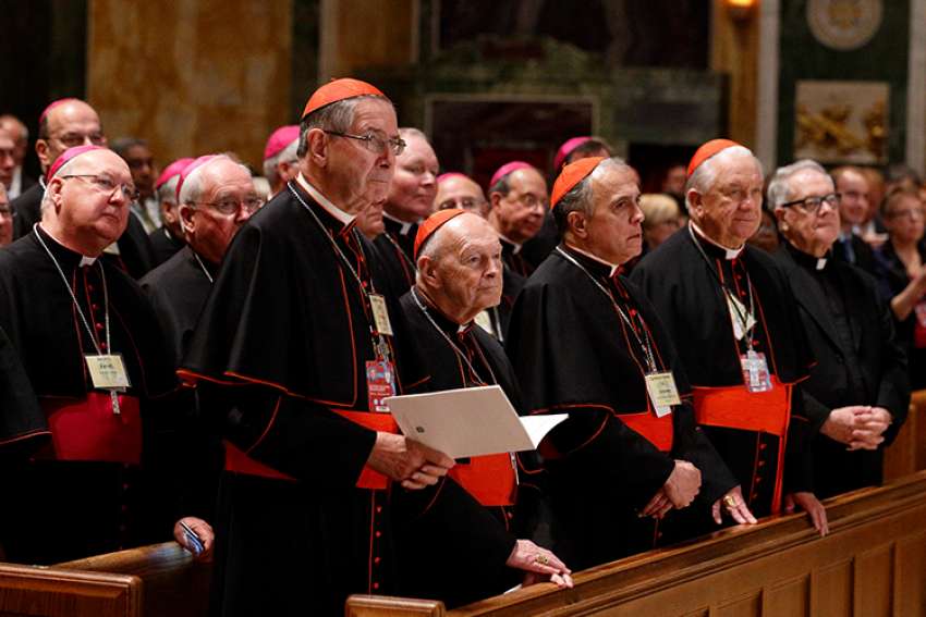  Cardinal Roger M. Mahony, retired archbishop of Los Angeles, Cardinal Theodore E. McCarrick, retired archbishop of Washington, Cardinal Daniel N. DiNardo of Galveston-Houston, and Cardinal Adam J. Maida, retired archbishop of Detroit, attend Pope Francis&#039; meeting with U.S. bishops in the Cathedral of St. Matthew the Apostle in Washington Sept. 23, 2015. Pictured in the second row is Bishop Kevin J. Farrell of Dallas, who served as an auxiliary bishop of Washington from 2001-2007