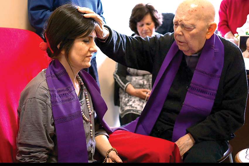 Pauline Father Gabriele Amorth performs an exorcism on Christina in the documentary The Devil and Father Amorth.