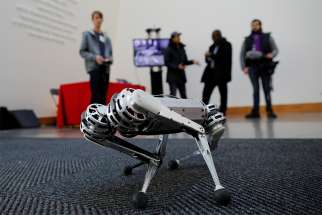 Students demonstrate the Mini Cheetah, a quadruped robot, during presentations to celebrate the new MIT Stephen A. Schwarzman College of Computing at the Massachusetts Institute of Technology in Cambridge Feb. 26, 2019. Speakers at a Feb. 25-27, 2019, Vatican meeting said the field of robotics needs ethical guidelines.