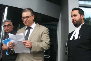 Steve Tourloukis, centre, lost his appeal against the Hamilton-Wentworth District School Board system. Also pictured from this June 2016 court appearance is Lou Iacobelli, left, chair of the Parental Rights and Education Defence Fund, and lawyer Alberto Polizogopoulos. 