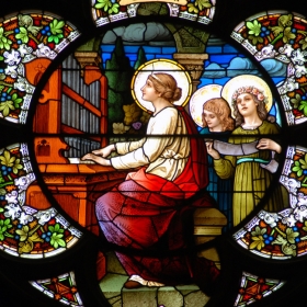 St. Cecilia is depicted in a stained-glass window at the Cathedral of the Immaculate Conception in Denver. (CNS photo/James Baca)