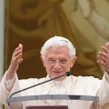 Pope Benedict XVI greets the crowd after praying the Angelus prayer from the balcony of his summer residence in Castel Gandolfo, Italy, Aug. 7.